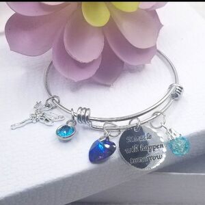 Adustible charm bracelet hand made silver toned